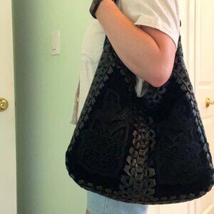 Get lucky! Lucky Brand black tooled leather purse